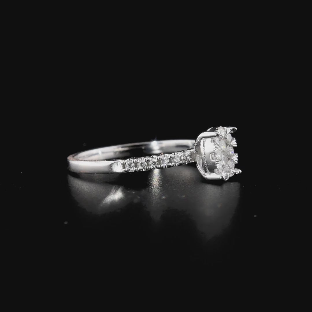 360 degree video of the natural diamond oval illusion cluster ring in 14K white gold