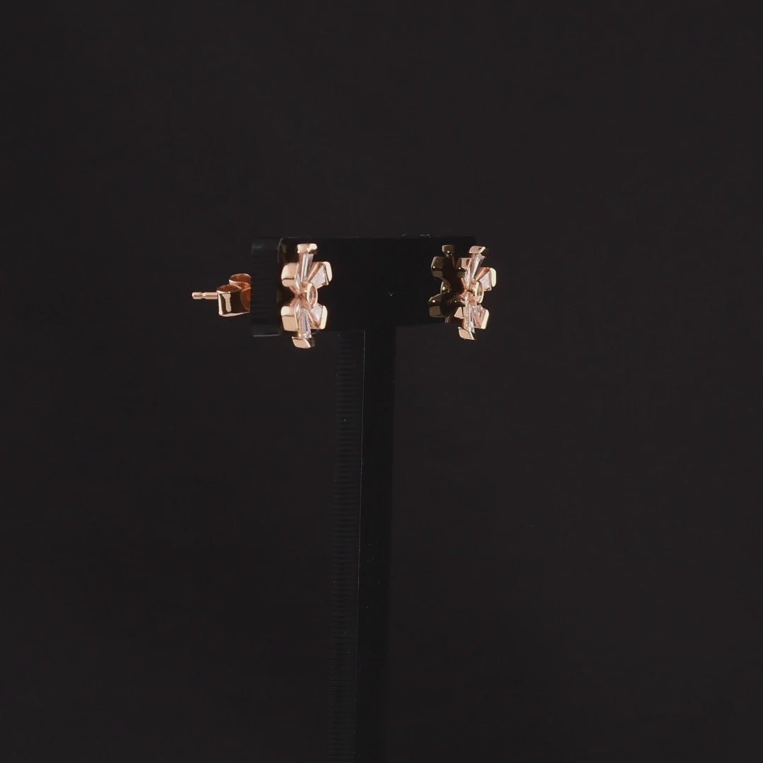 360-degree video of the tapered baguette natural diamond flower stud earrings in 18K rose gold