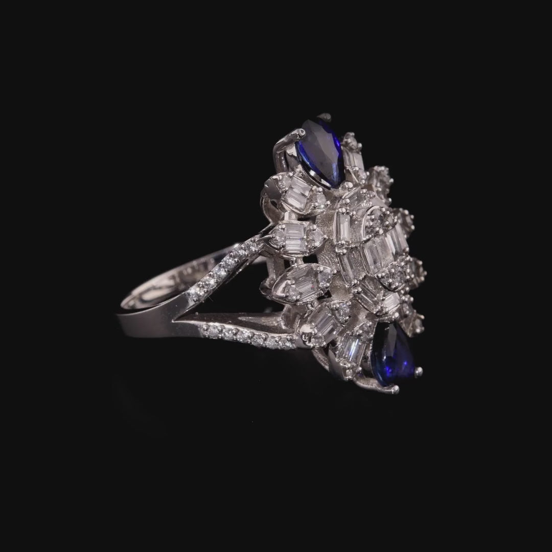 360 degree video of the sapphire and natural diamond baguette starburst cocktail ring in 14K white gold