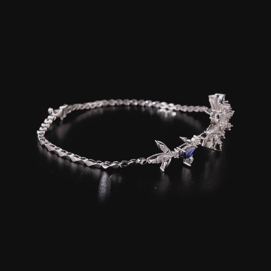 360 degree video of the natural diamond and sapphire flower station bracelet in 14K white gold