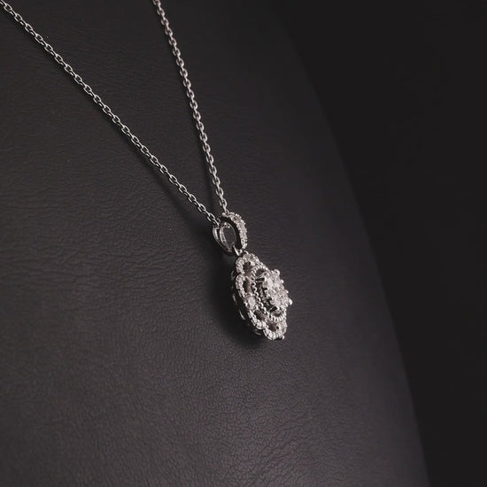 360-degree video of the natural diamond scalloped halo cluster pendant necklace in 14K white gold