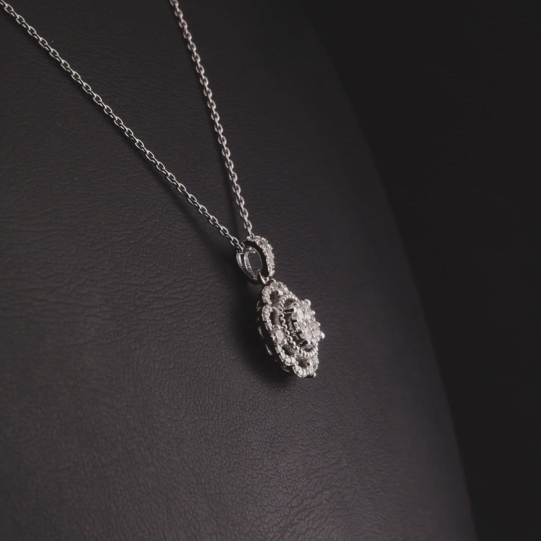 360-degree video of the natural diamond scalloped halo cluster pendant necklace in 14K white gold