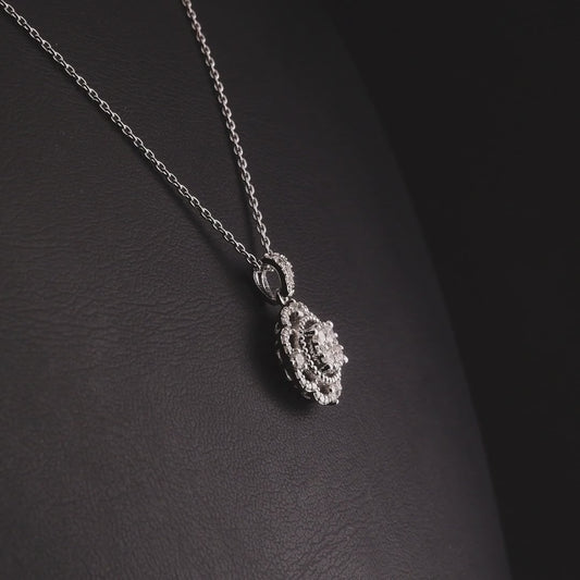 360-degree video of the natural diamond scalloped halo cluster pendant necklace in 14K white gold