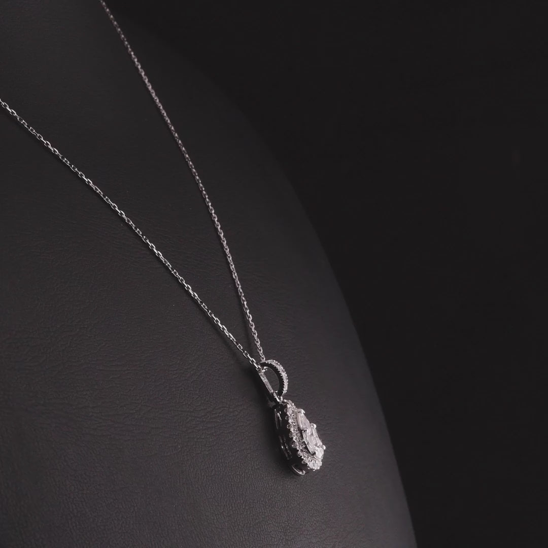 360 degree video of the pear halo natural diamond pendant necklace in 14K white gold