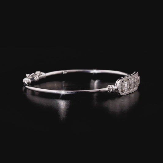 360 degree video of the natural diamond baguette bar hinged bangle in 18K white gold
