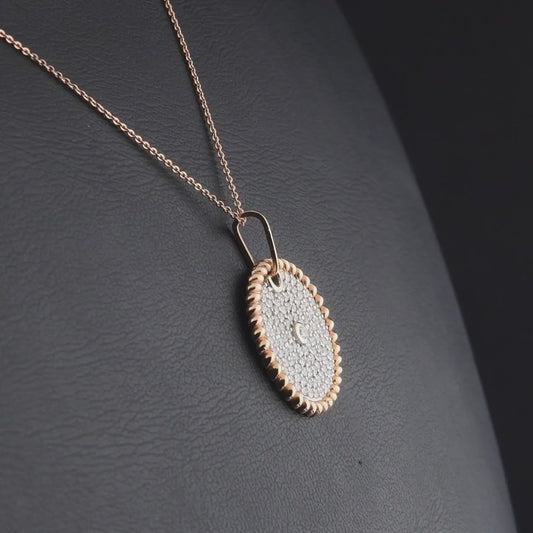 360-degree video of the 0.72 ct tw natural diamond pavé medallion pendant necklace in 14K rose and white gold