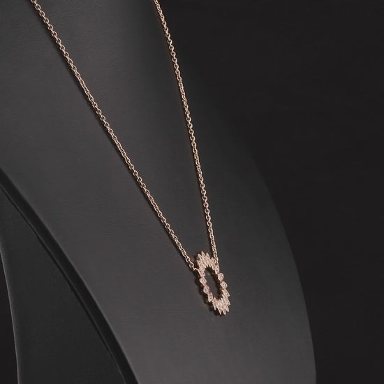 360 degree video of a natural diamond petal circle pendant necklace in 14K rose gold.