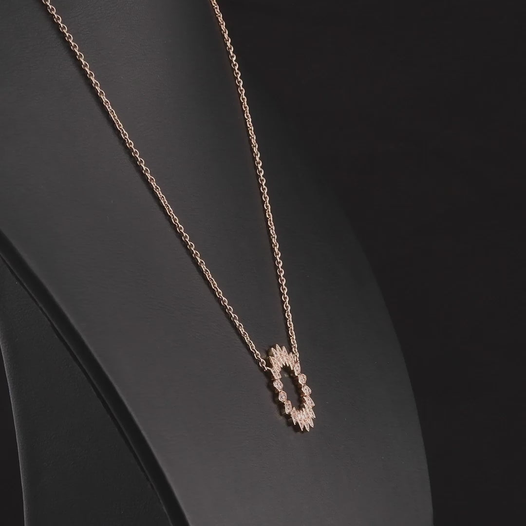 360 degree video of a natural diamond petal circle pendant necklace in 14K rose gold.