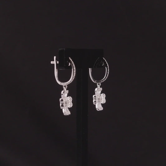 360 degree video of the natural diamond clover drop huggie earrings in 18K white gold