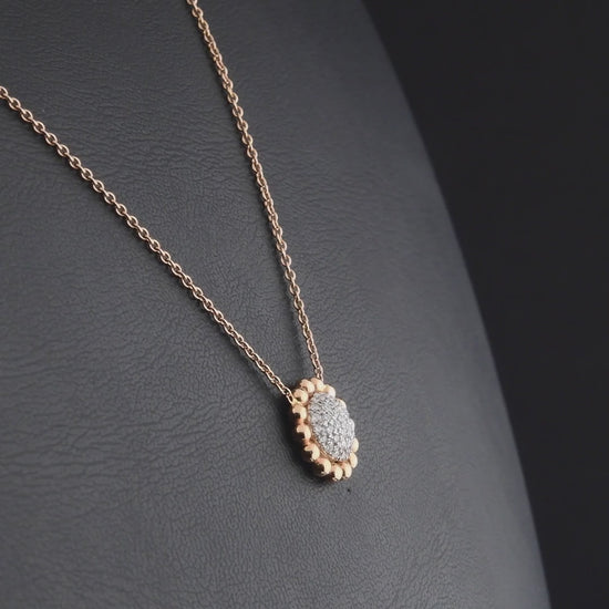 360 degree video of the beaded pavé disc natural diamond pendant necklace in 14K rose and white gold
