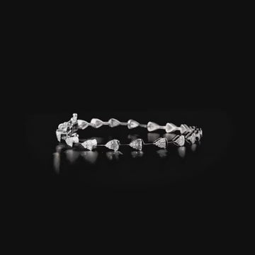 360 degree video of the natural diamond baguette teardrop station bracelet in 14K white gold
