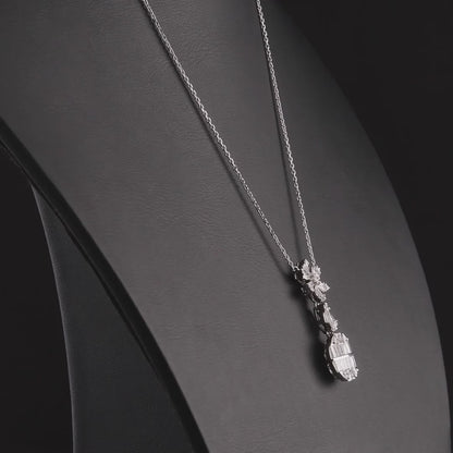 360 degree video of the baguette natural diamond flower drop pendant necklace in 14K white gold