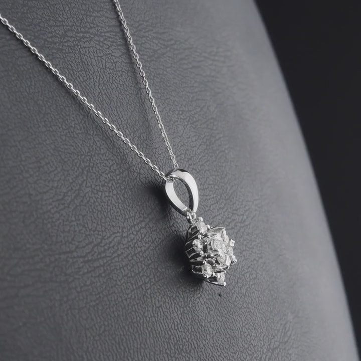 360-degree video of the lotus star natural diamond pendant necklace in 14K white gold.