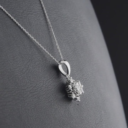 360-degree video of the lotus star natural diamond pendant necklace in 14K white gold.