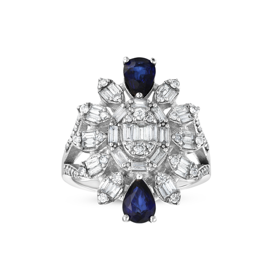 Sapphire and natural diamond baguette starburst cocktail ring in 14K white gold, top view of the oval baguette centre, ten petals and two pear blue sapphires