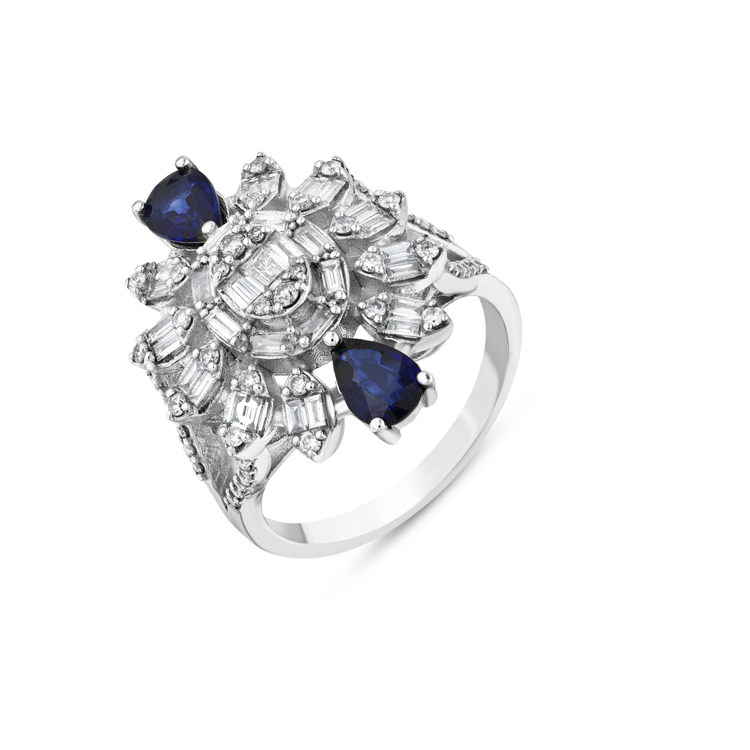 Sapphire and natural diamond cocktail ring in 14K white gold, angled view of the split pavé shank and plain band
