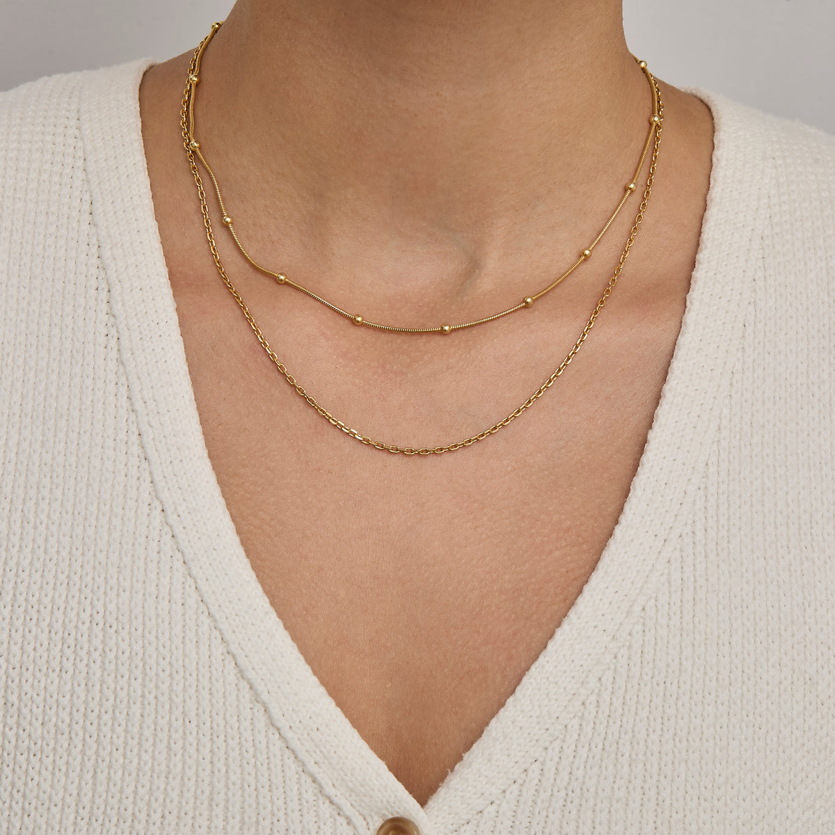 Layered chain necklace look with the gold satellite chain