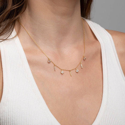 Close detail of the Satellite Charm Necklace in 18K Gold Vermeil. Safe for sensitive skin, premium handmade jewelry.