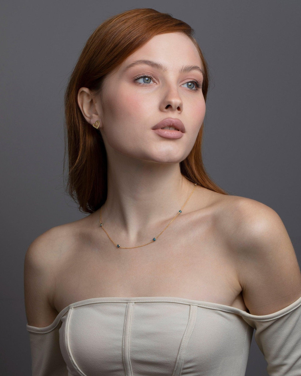 The Satellite Evil Eye Necklace Chain styled in 18K Gold Vermeil — elegant everyday jewelry. Tarnish-resistant.