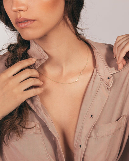 Sideways Initial Necklace as a thoughtful birthday gift in 18K Gold Vermeil. Hypoallergenic, no green marks.
