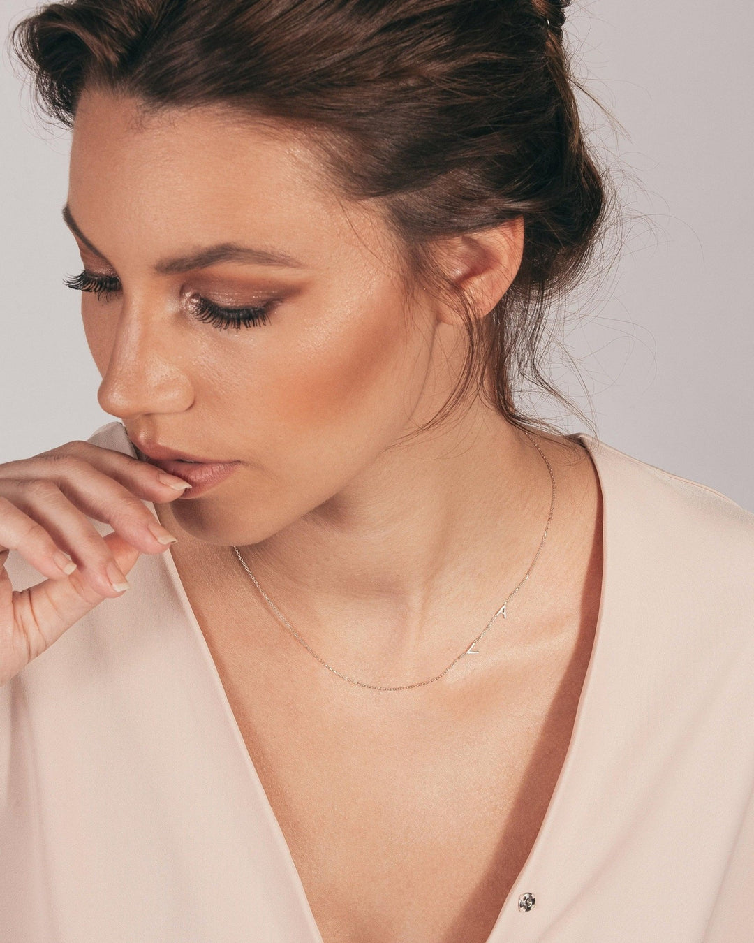 The Sideways Initial Necklace as a graduation gift in 18K Gold Vermeil. Safe for sensitive skin, made for keeping.