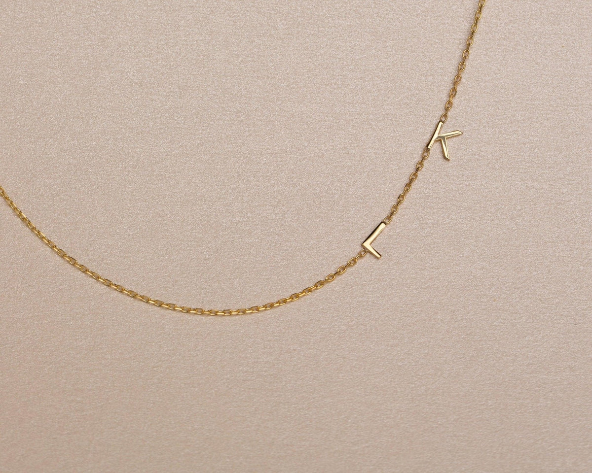 Macro detail of the Sideways Initial Necklace showcasing craftsmanship in 18K Gold Vermeil. Tarnish-resistant, handmade.