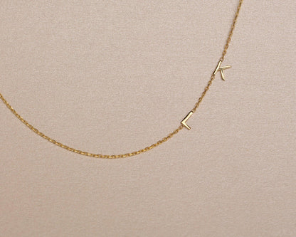 Macro detail of the Sideways Initial Necklace showcasing craftsmanship in 18K Gold Vermeil. Tarnish-resistant, handmade.