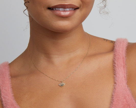 Close detail of the Silver Evil Eye Necklace in 18K Gold Vermeil. Safe for sensitive skin, premium handmade jewelry.