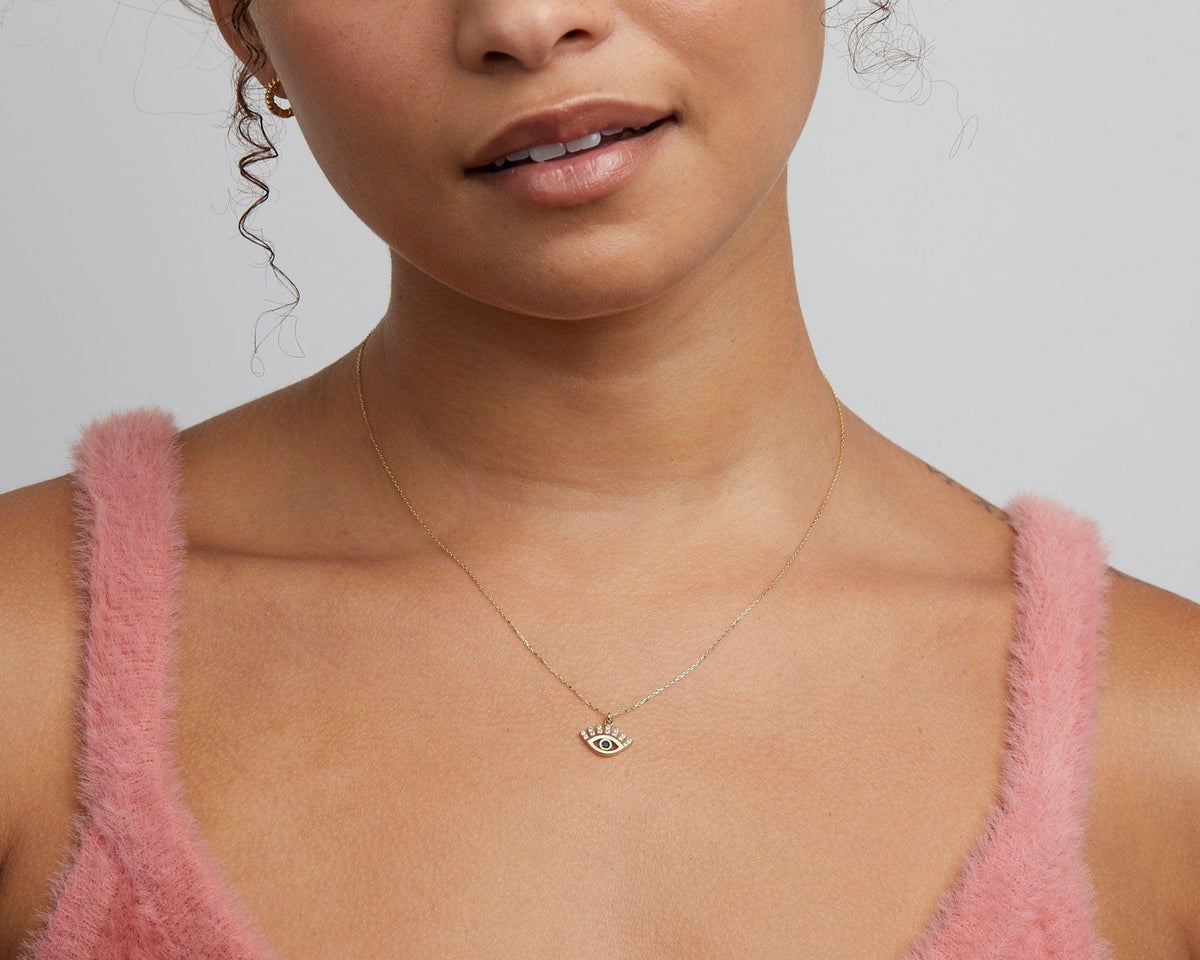 Macro detail of the Silver Evil Eye Necklace showcasing craftsmanship in 18K Gold Vermeil. Tarnish-resistant, handmade.