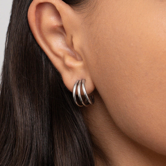 Close detail of the Silver Triple Hoops in Stainless Steel. Hypoallergenic, tarnish-free, premium handmade jewelry.