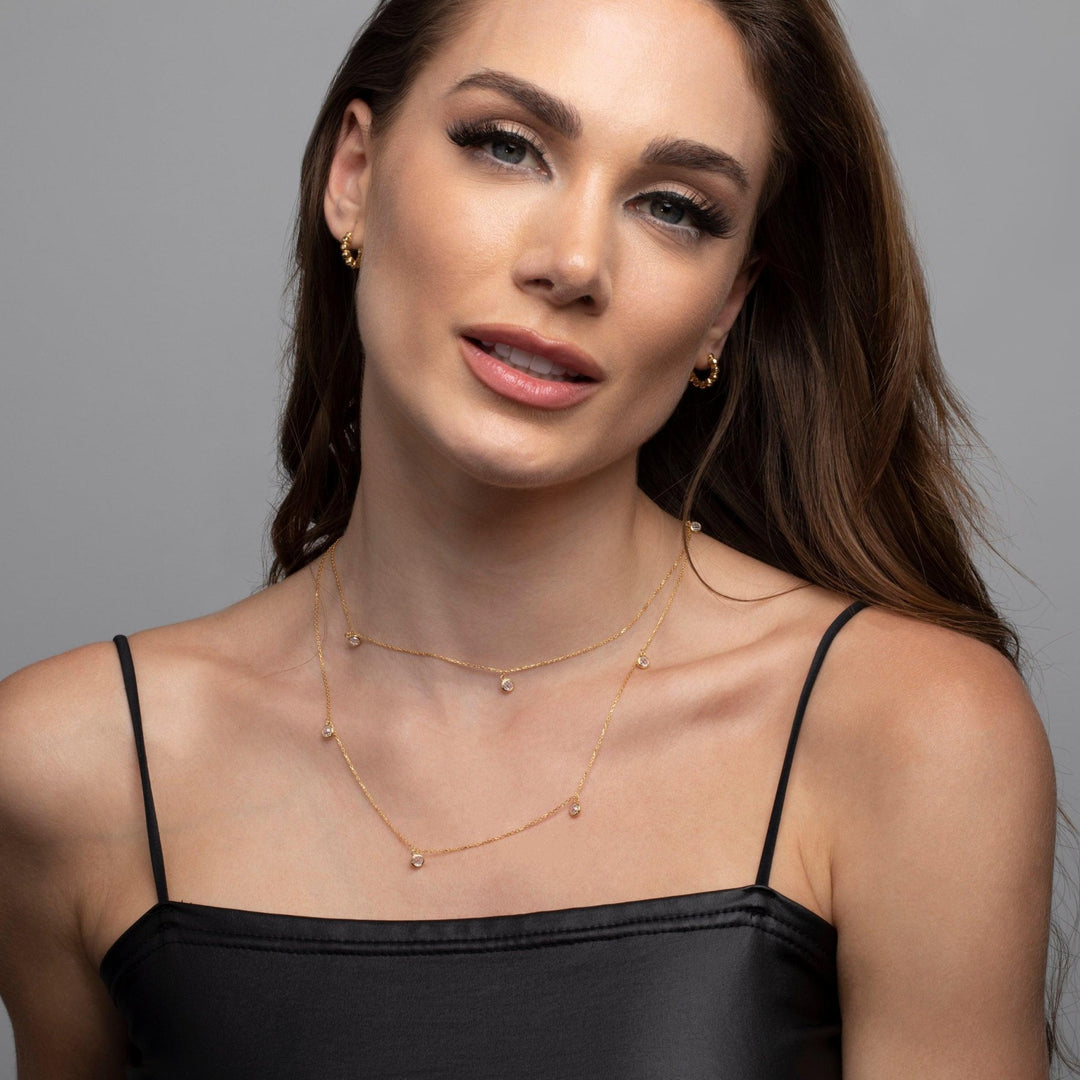 The Silver Satellite Necklace styled in 18K Gold Vermeil — elegant everyday jewelry. Hypoallergenic, no green marks.