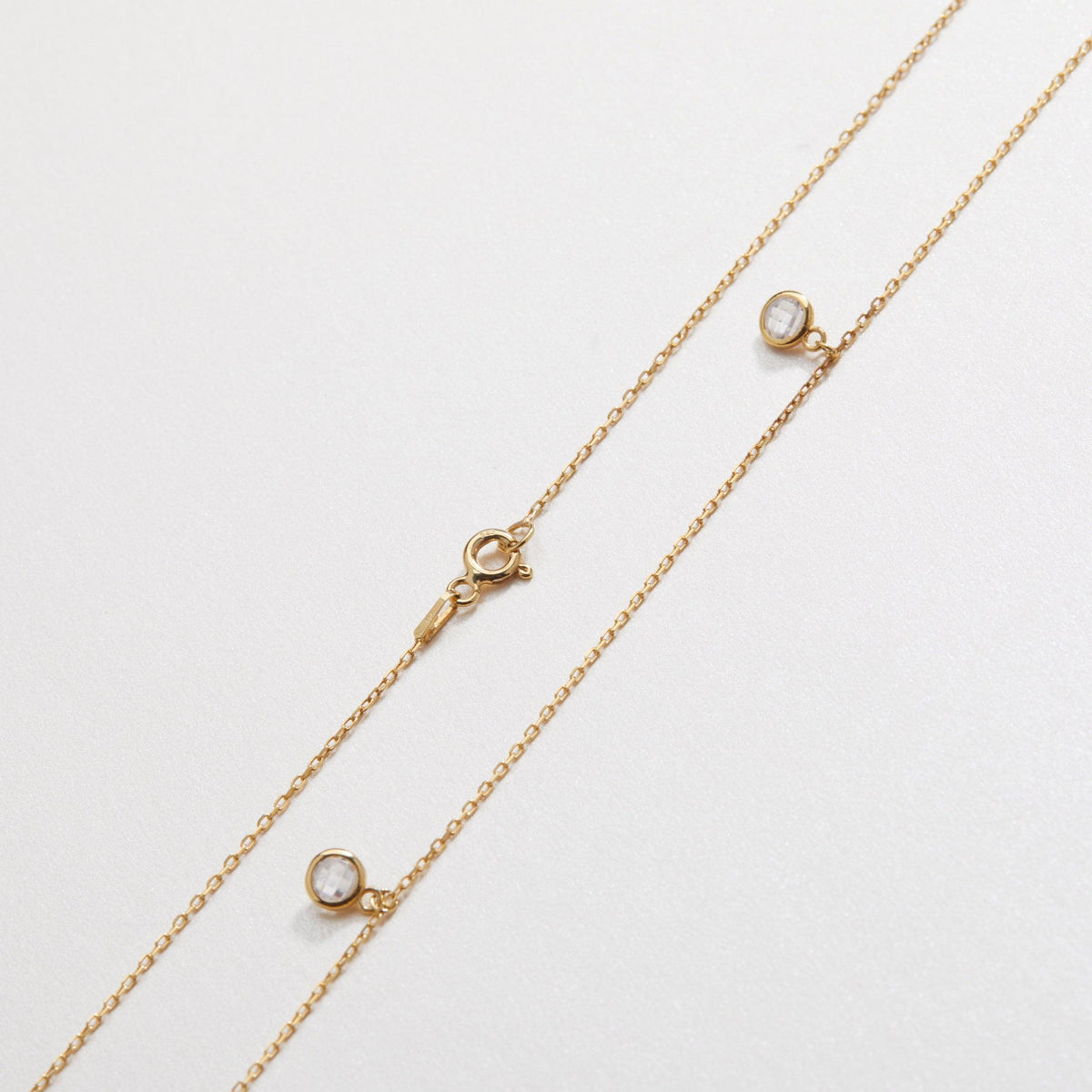 The Silver Satellite Necklace worn in 18K Gold Vermeil — refined accessory for women. Safe for sensitive skin.