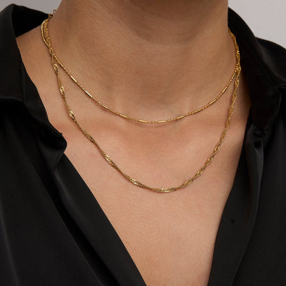 Layered chain necklace look with the gold Singapore chain