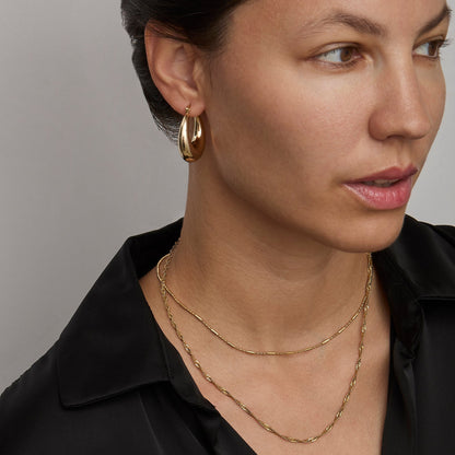 Gold Singapore chain necklace at collarbone length