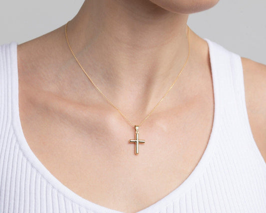 Close detail of the Small Cross Necklace in 18K Gold Vermeil. Safe for sensitive skin, premium handmade jewelry.