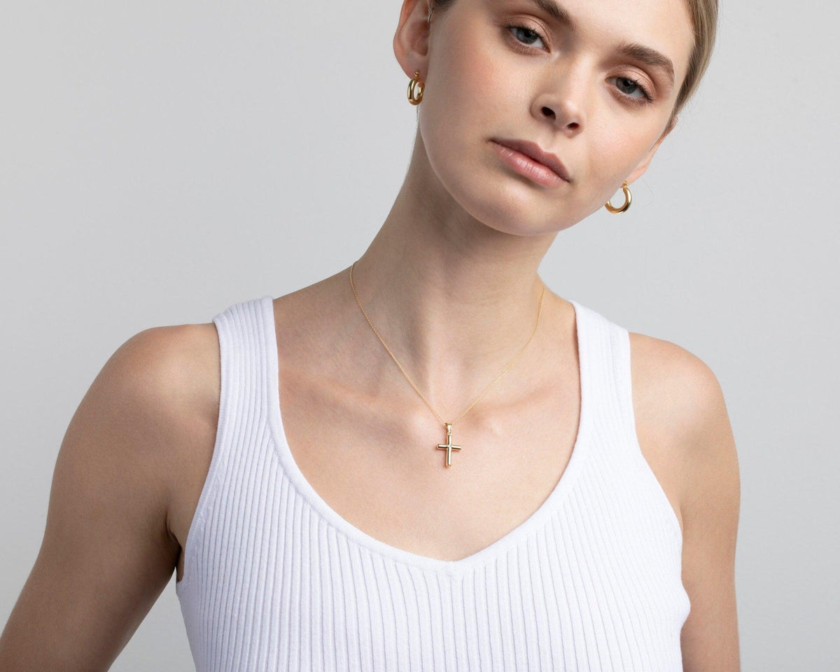 The Small Cross Necklace as a confirmation gift in 18K Gold Vermeil. Safe for sensitive skin, made for keeping.