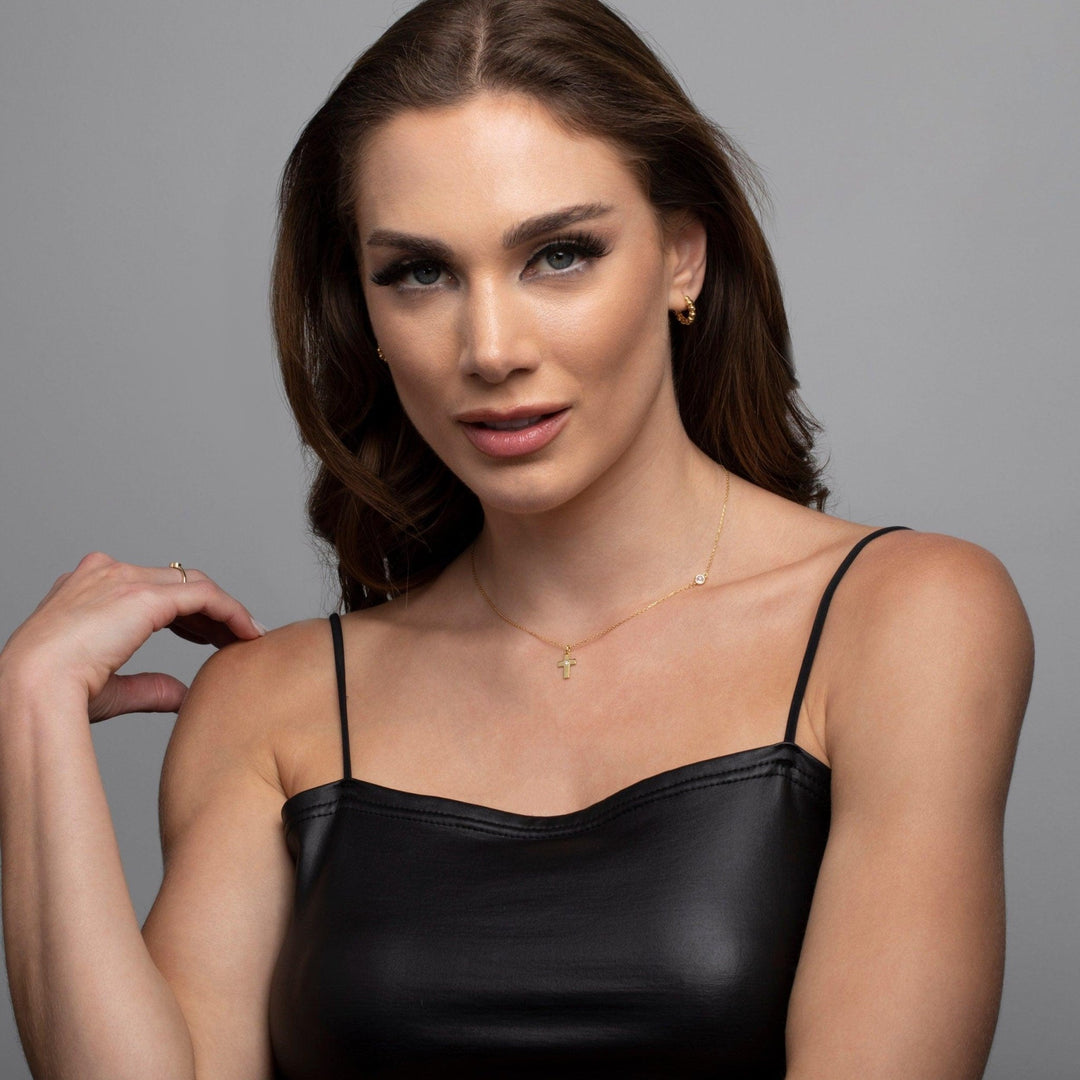 The Small Cross Necklace with Diamond styled in 18K Gold Vermeil — elegant everyday jewelry. Hypoallergenic, no green marks.