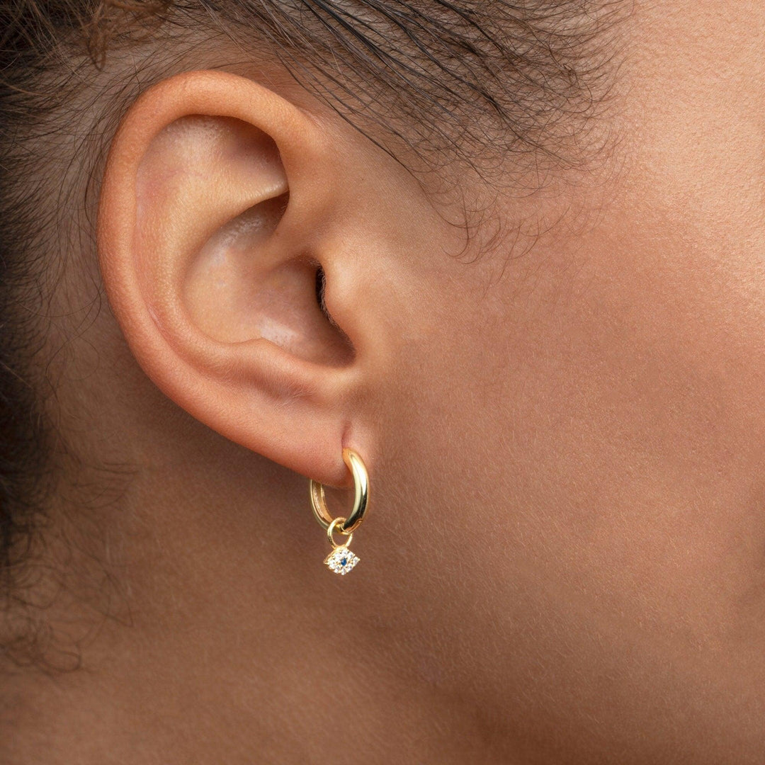Close detail of the Small Pavé Evil Eye Dangle Earrings in 18K Gold Vermeil with CZ Diamond. Tarnish-resistant, premium.