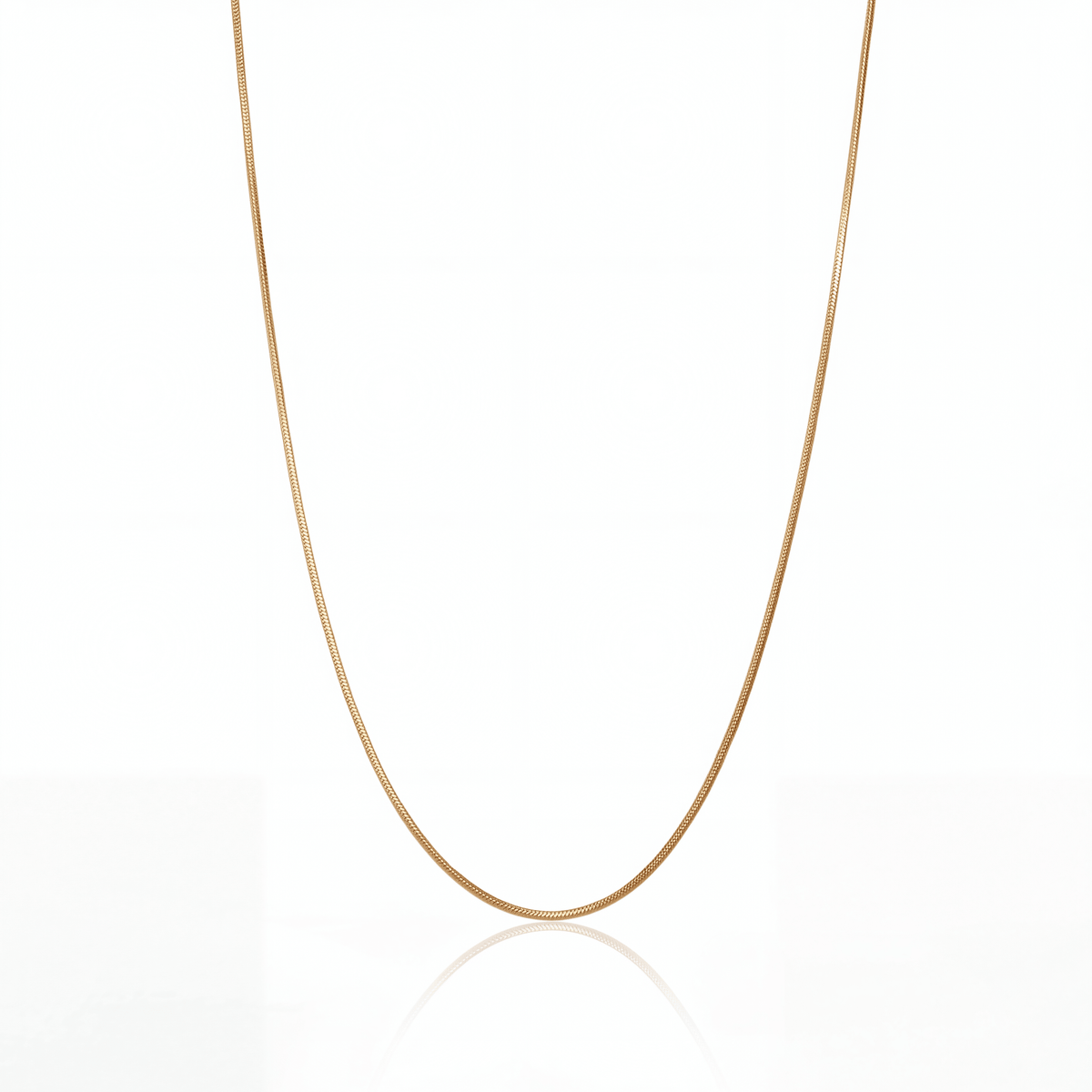 Snake chain necklace in 18K gold, 1 mm flat snake chain on white background