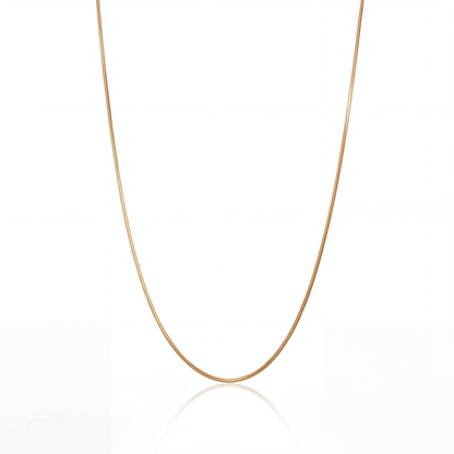Snake chain necklace in 18K gold, 1 mm flat snake chain on white background