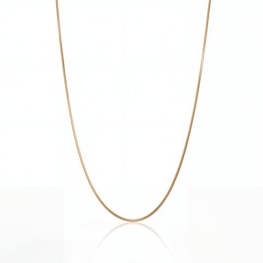 Snake chain necklace in 18K gold, 1 mm flat snake chain on white background