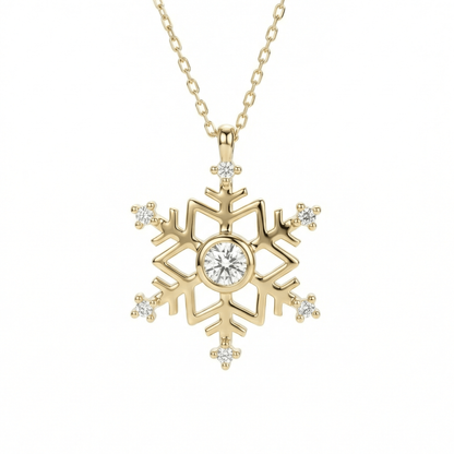 Snowflake pendant necklace in 14K solid gold, with a round CZ center stone in a bezel and six small CZ stones at the arm tips.