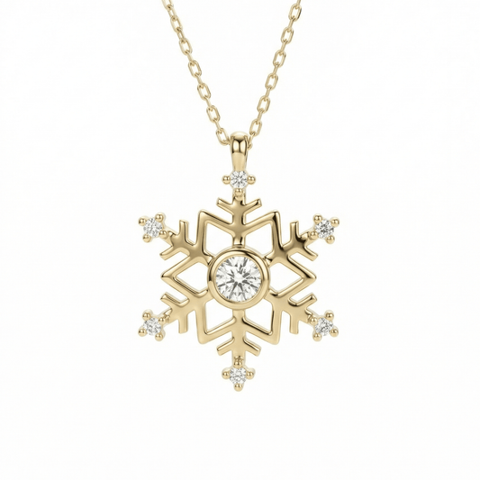 Snowflake pendant necklace in 14K solid gold, with a round CZ center stone in a bezel and six small CZ stones at the arm tips.