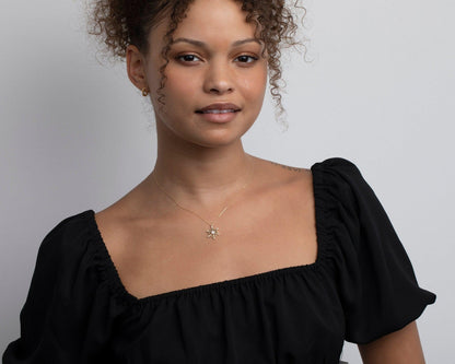 The Snowflake Pendant Necklace styled in 18K Gold Vermeil — elegant everyday jewelry. Hypoallergenic, no green marks.