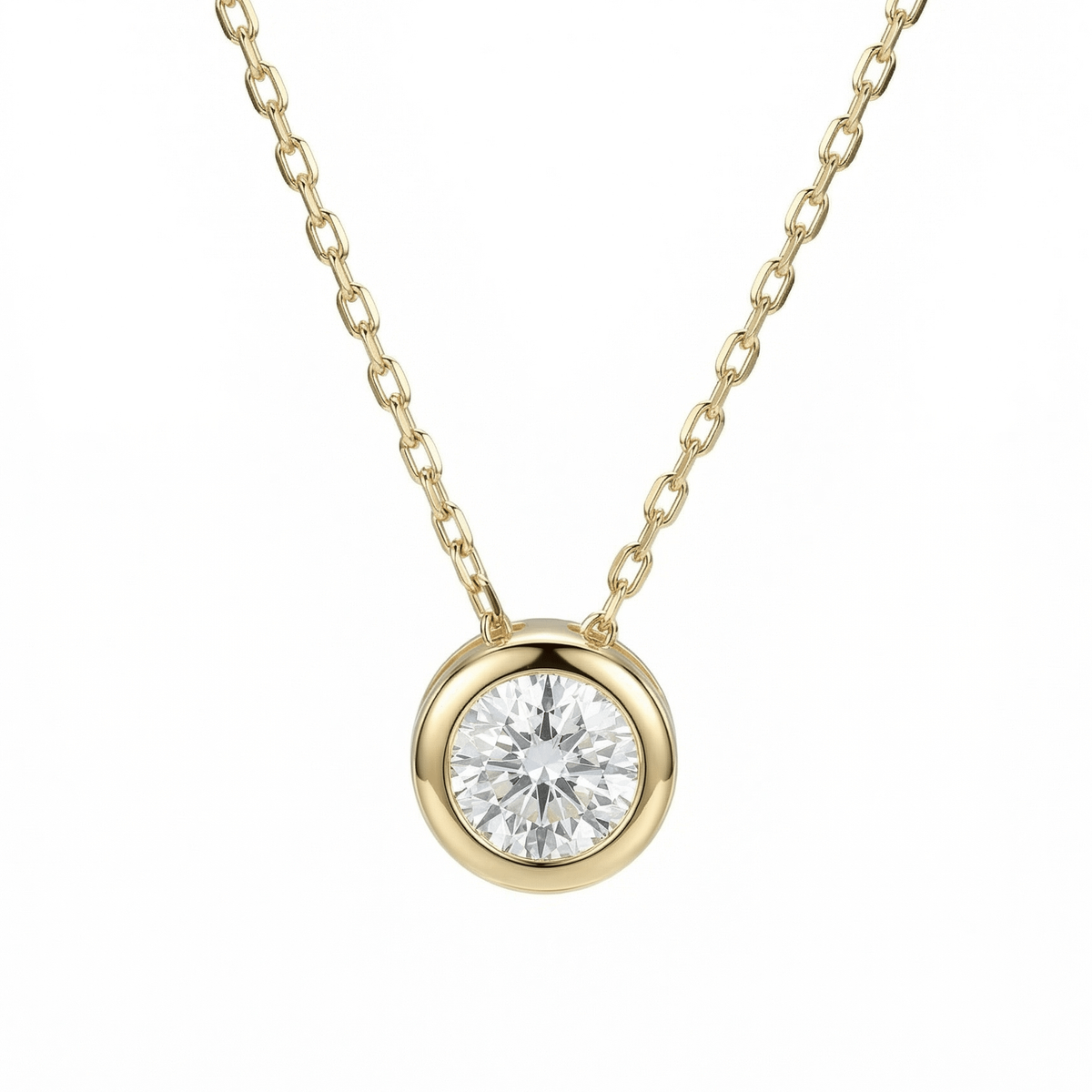 Solitaire Pendant Necklace in 14K solid gold: a 6mm CZ in a bezel setting on a fine 14K gold chain.