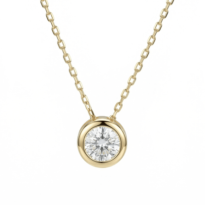 Solitaire Pendant Necklace in 14K solid gold: a 6mm CZ in a bezel setting on a fine 14K gold chain.