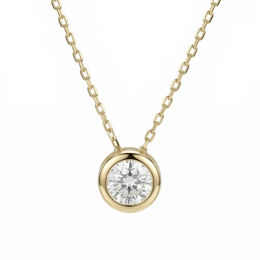 Solitaire Pendant Necklace in 14K solid gold: a 6mm CZ in a bezel setting on a fine 14K gold chain.