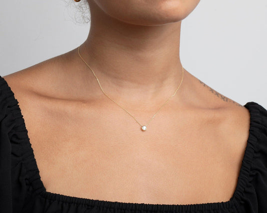 Close detail of the Solitaire Pendant Necklace in 18K Gold Vermeil with CZ Diamond. Hypoallergenic, no green marks, premium.