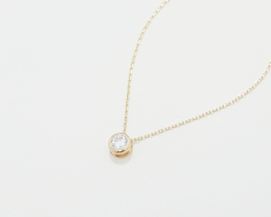The Solitaire Pendant Necklace styled in 18K Gold Vermeil — elegant everyday jewelry. Tarnish-resistant.