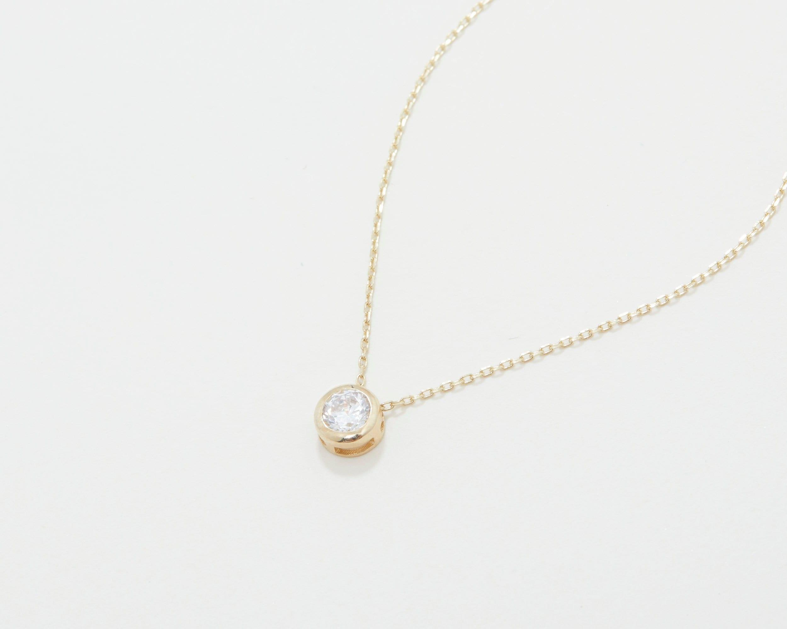 The Solitaire Pendant Necklace styled in 18K Gold Vermeil — elegant everyday jewelry. Tarnish-resistant.
